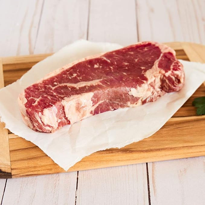 Nebraska Star Beef Prestige Steaks - 12 Packs with Signature Seasoning (12-12oz NY Strip)