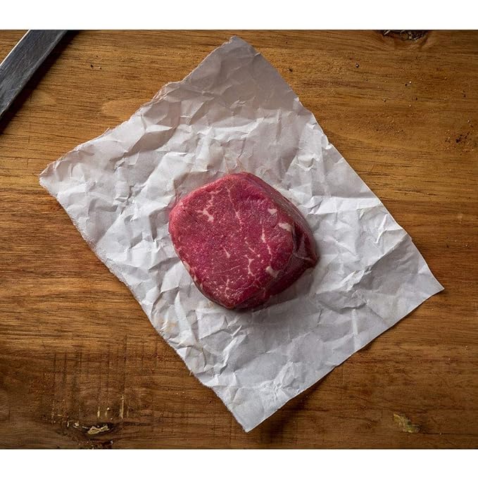Aged Premium Angus Ribeye and NY Strip and Filet Mignon by Nebraska Star Beef - All Natural Hand