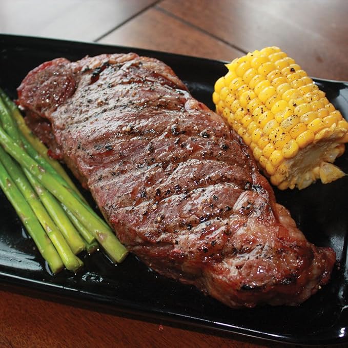 Aged Premium Angus Ribeye and NY Strip and Filet Mignon by Nebraska Star Beef - All Natural Hand