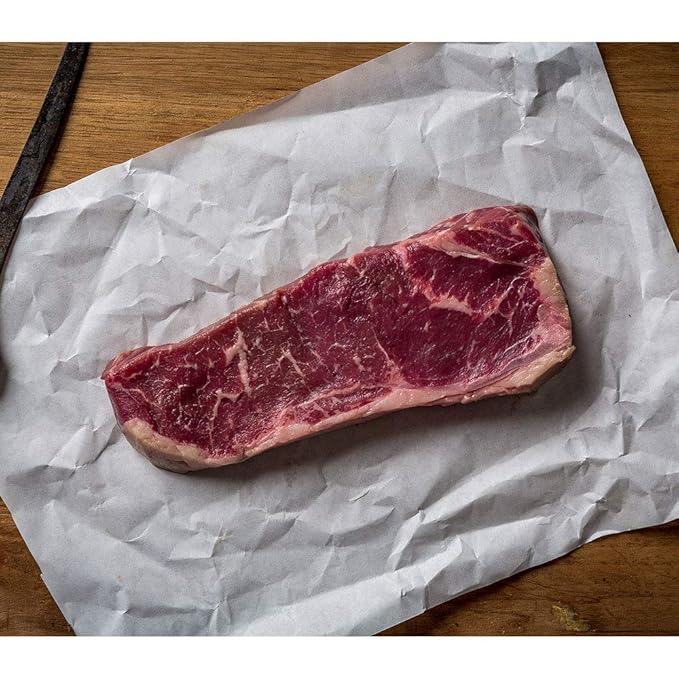 Aged Premium Angus Ribeye and NY Strip and Filet Mignon by Nebraska Star Beef - All Natural Hand