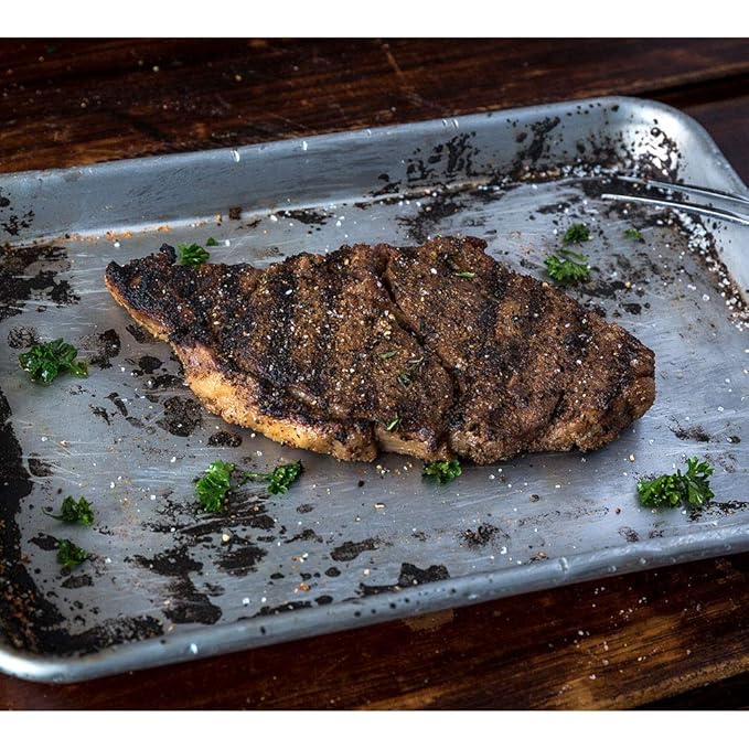 Aged Premium Angus Ribeye and NY Strip and Filet Mignon by Nebraska Star Beef - All Natural Hand